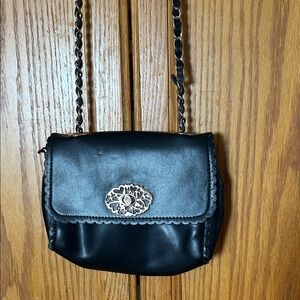 Simon Chang Black Crossbody Bag with Decorative Emblem